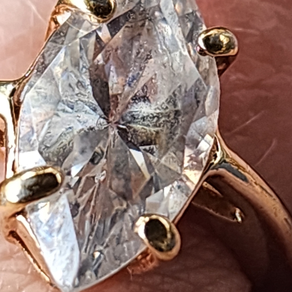 14k rose gold and salt and pepper diampnd engagement ring.
